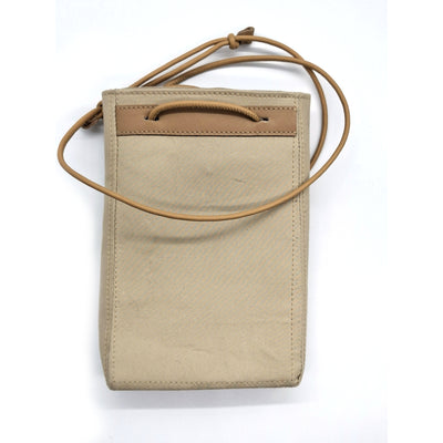 Photographie du produit POCHE TELEPHONE  Beige& Jaune, entre sac et poche téléphone